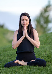 Woman sitting in meditation posture