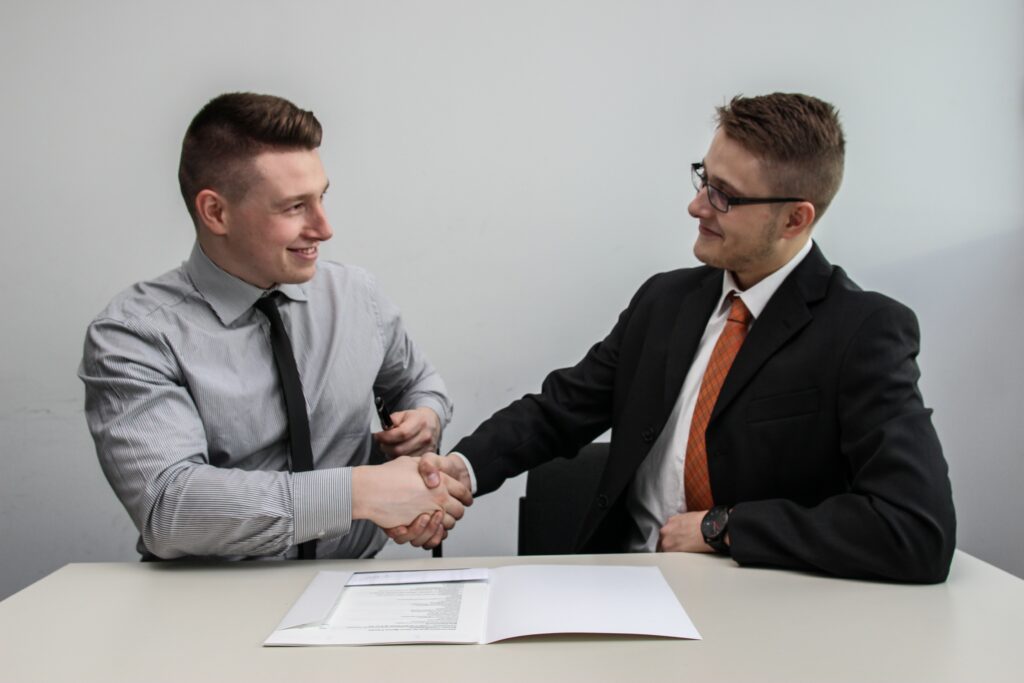 Two men hand shake image